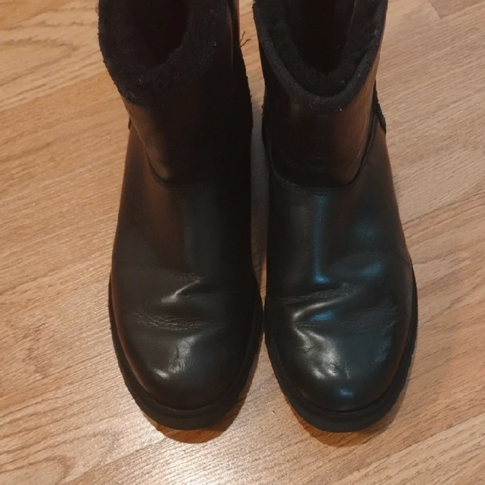 UGG Black Leather Winter Boots with Shearling Trim